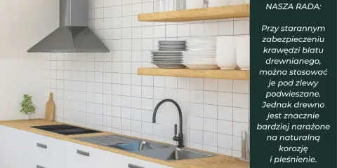 Nowoczesna kuchnia z drewnianym blatem, pod którym zamontowano zlew podwieszany. Białe płytki i stalowy okap tworzą czysty design.